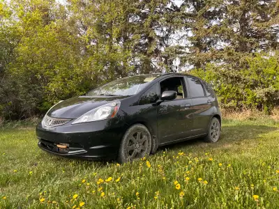 Freshly detailed Honda fit LX - Spacious and versatile - 176000kms - Studded winter tires on alloy w...