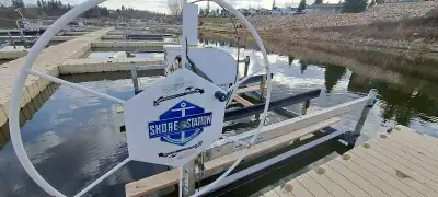Shore Station boat lift, 3500 lb capacity, currently set up for a 21ft pontoon boat, Can be Easily c...