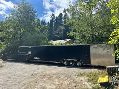 48' American Hauler Trailer is registered and insured as toy haulier 26of living area 22' of shop ar...