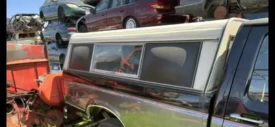 Looking for a Aluminum or steel 8 foot long truck cap. Windows/glass intact isn't necessary. Just ne...