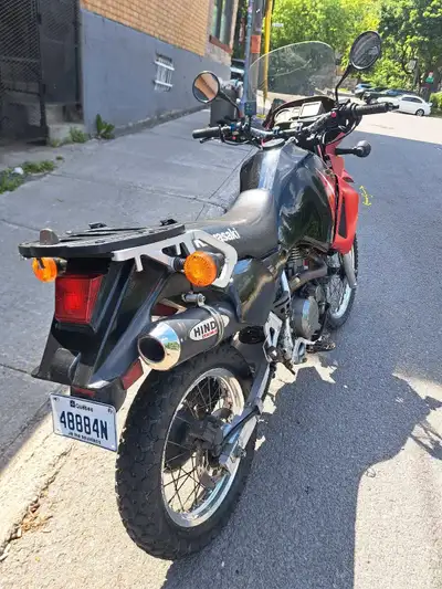 Moto a1 , huile moteur et freins boujie carbu filtre a air pneu avant arrière changé poignée chauffa...