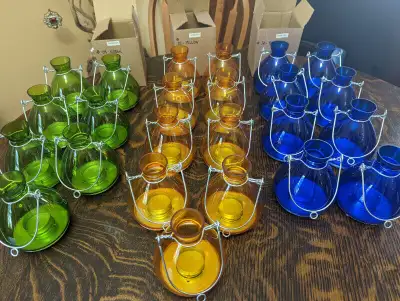 NEW, 24 GLASS T-LIGHT LANTERNS 7 GREEN, 9 YELLOW, 8 BLUE. 5.5"H x 4"W. Great for anytime parties, in...