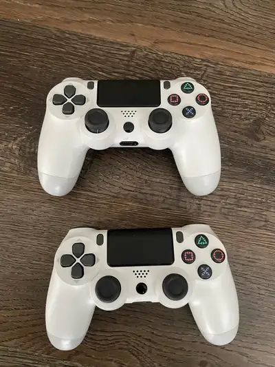 PS4 controllers for sale. Both are in good condition and work perfectly. Clean and well maintained....