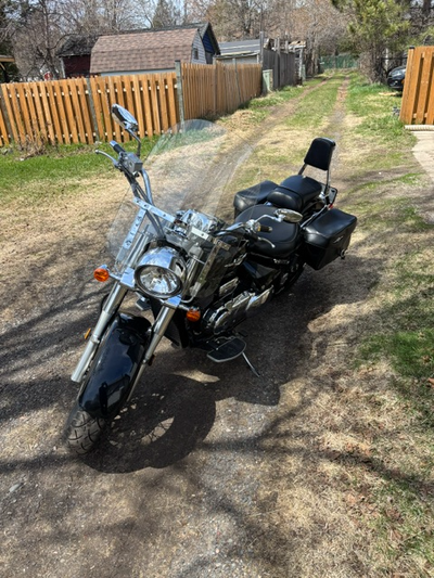 bought used in 2014, new tires in 2022, new battery in 2025, leather saddle bags, passenger seat/bac...