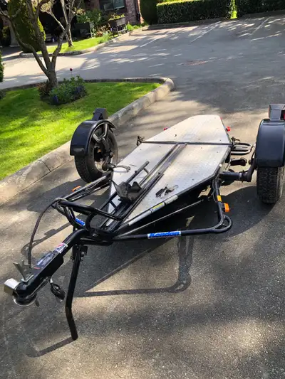 This Kendon trailer is perfect for hauling your motorcycle or other small vehicles with ease! This t...