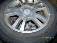 4 215/60/16 Michelin tires and Rims