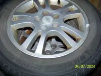 4 215/60/16 Michelin tires, Rims & lug nuts