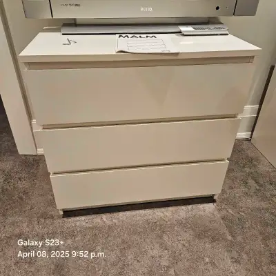 This is an IKEA MALM 3-drawer dresser, perfect for adding storage to any bedroom or living space. It...