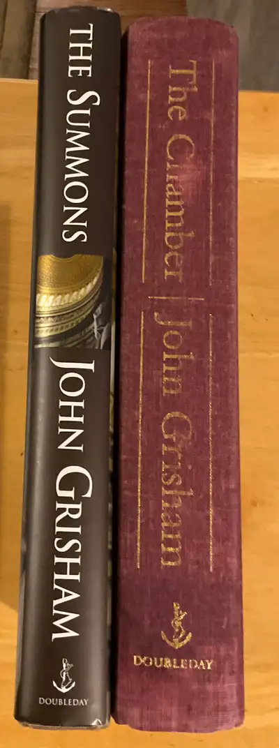 Two Hard Cover John Grisham Novels, View more