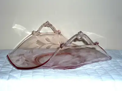 As shown in pictures ... from an estate ...... Light pink color glass tray with delicate scroll like...