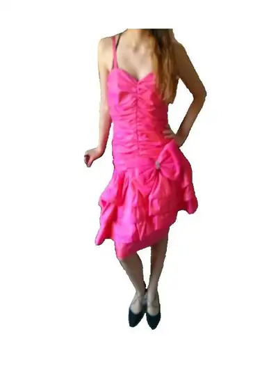Hot pink dress that changes hues in the light. Side ruching with bow detail and diamond accents. Wou...