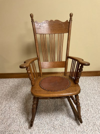 Antique press back rocking chair