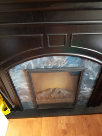 Electric Fireplace with mantel in like new condition
