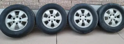 Hyundai rims and tires from a 2007 Entourage. Two tires are Bridgestone Ecopia H/L 422 Plus 225/70R1...