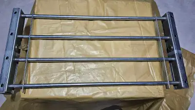 These sturdy security bars are designed to fit a basement window, providing an additional layer of s...