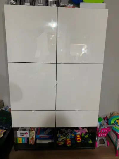 Tons of storage. 2 large drawers and several adjustable shelves. Great for kids storage, basement or...