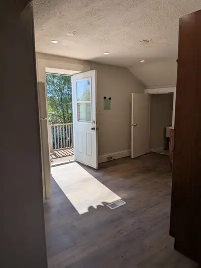 This bright spacious 1 bedroom 1 bathroom unit (living room can be easily converted to a second bedr...