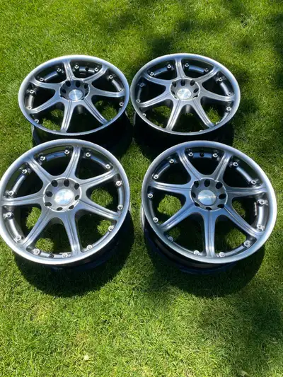 Selling a set of four used Katana rims, 17”, some curb rash , but overall they are in good condition...