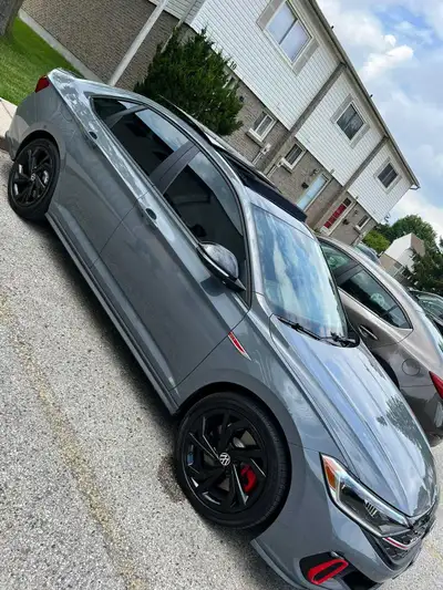 Up for sale is my sleek, grey Volkswagen Jetta GLI, a sporty sedan that offers a fun driving experie...