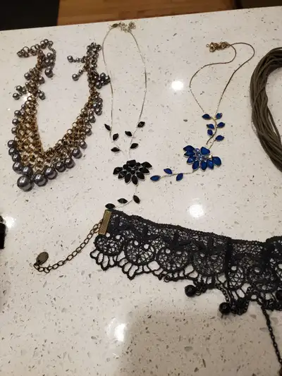 My wife is going through her costume jewelry and she has way too much. She's selling this whole lot...