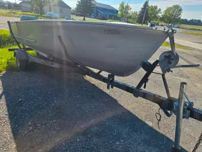 14ft deep v Princecraft. No leaks. Trolling motor, battery box included. Trailer included. Has new b...
