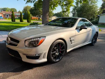 I believe I am the second non-smoker owner of this immaculate showroom condition SL63 since 35k kms....