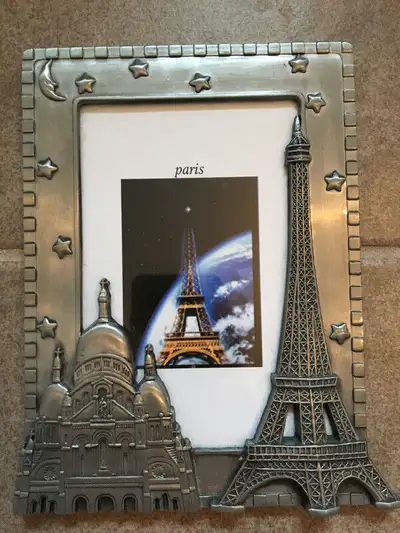 Pewter picture frame of Paris $10, holds 3 1/2” x 5” picture, View more