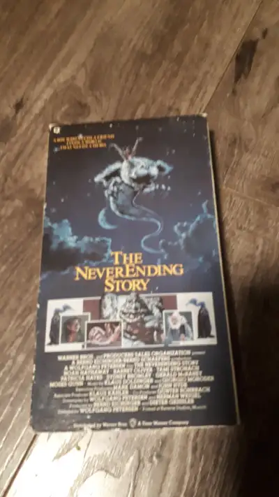 * * Please Read * * Location East Ottawa VHS The NeverEnding Story 1984 Family/Fantasy On his way to...