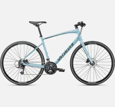 Selling a Specialized Sirrus 2.0 hybrid fitness bike in a great-looking Gloss Sky Blue color. Size L...