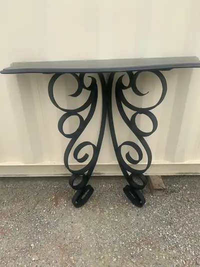 Nice piece. Length 42 inches, height 39 inches hand, forged antique with black marble top
