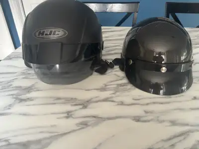 Two helmets in excellent condition one has face and sun shield