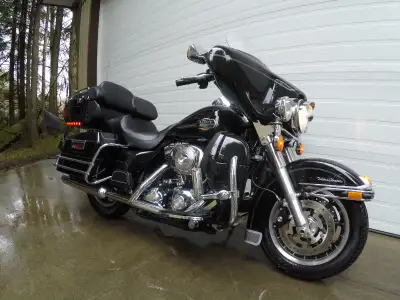 Like new Ultra Classic Harley Davidson, low miles, new tires and battery.