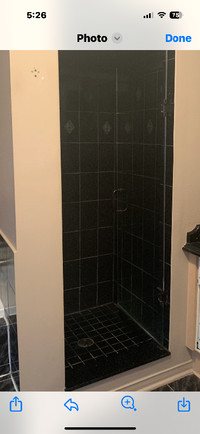 Glass shower door with hardware