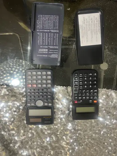 These two pre-owned Casio scientific calculators are in good condition and ready to assist with your...