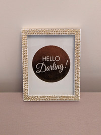 A wooden 8x10 inch shadow box displaying "Hello Darling"