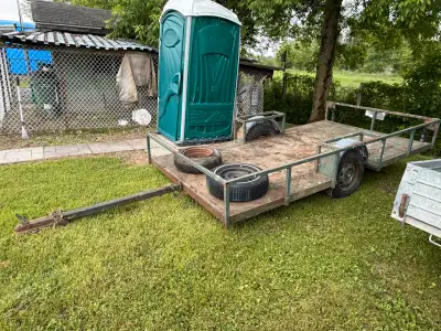 Custom made flat bed trailer for lawn mower, atv etc. Opening from the back and 2 on the sides. Year...
