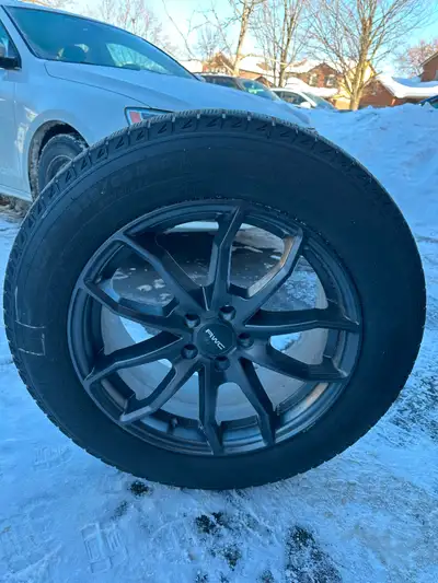 Selling a full set of 4 Michelin X-Ice winter tires mounted on aftermarket anthracite grey rims. Tir...