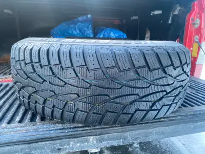 (4) Uniroyal Tiger Paw Winter Tires on Rims Size-235/65R17 These were used on a Honda CRV and only u...