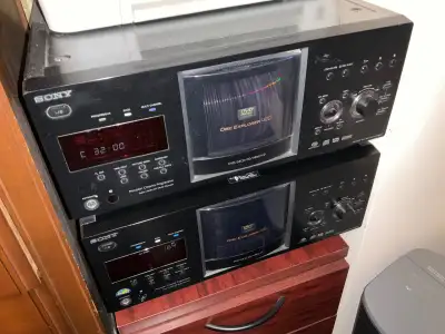 400 DVD MOVIES STORED IN 2 SONY 400 DISC PLAYERS, View more
