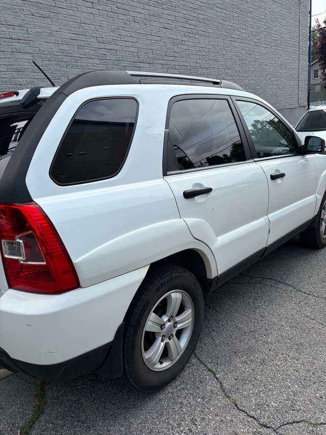 Kia Sportage — photo 2