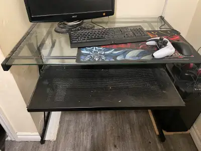 Glass desk $20 obo I’m moving need gone