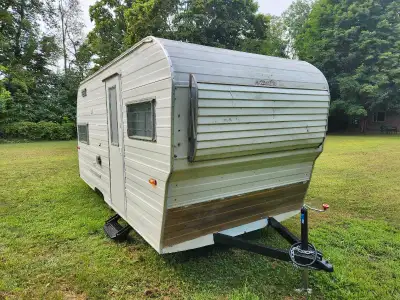 Beautiful, Vintage and Lightweight Golden Falcon 15' Camper. Approximately 1600 lbs. Entirely refurb...