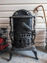 Antique decorative cast iron stove one of a kind