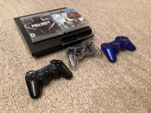 PS3 USED NO CABLES WITH 3 CONTROLLERS AND 2 GAMES in Sony Playstation 3 in Mississauga / Peel Region