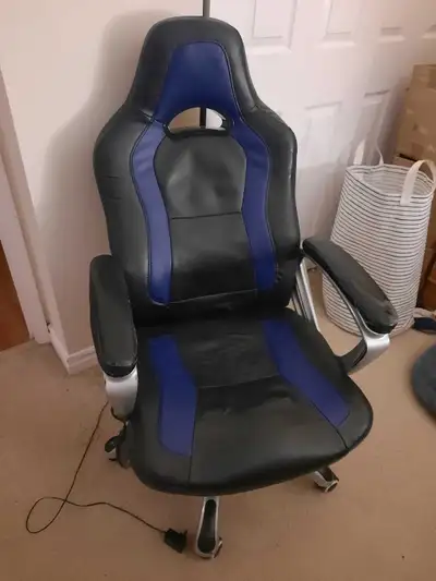 Selling my old gaming chair with working heat and massage. In pretty good shape except for one armre...