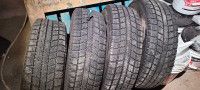 Set of 225 65 17 Toyo Observe GSI-5 Winter Tires on rims 