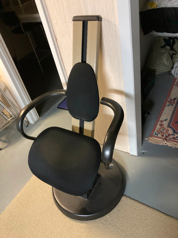 MCM tilting chair! It tilts forward to support your lower back