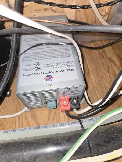 WFCO 55 amp Power Convertor. Working great as seen by Multimeter. Changed to Lithium batteries from...
