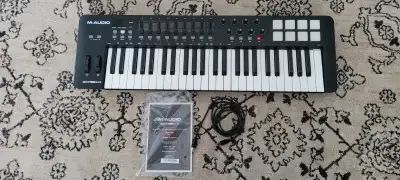 Like new, M-Audio Oxygen 49 MIDI Keyboard Controller Works well for Ableton, FL Studio, Logic. Like-...