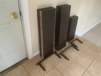 These are six floating wall shelves in a dark brown finish. They are in good condition, and still st...